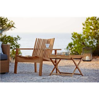 Stackable lounge armchair in teak - Amaze | Cane-Line