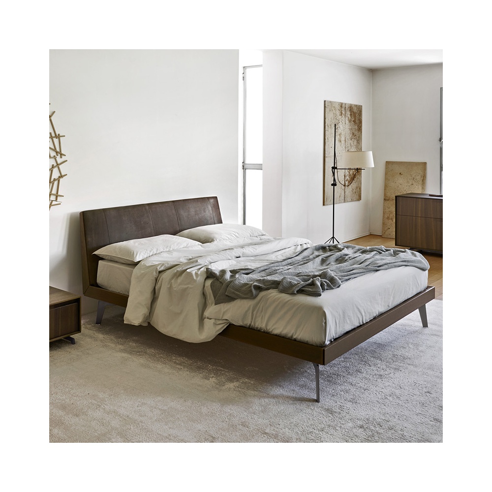 Febo X bed with padded headboard and wood frame