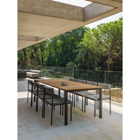 Outdoor dining table in wood and travertine - Casilda