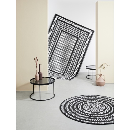 black and white round rug ambient